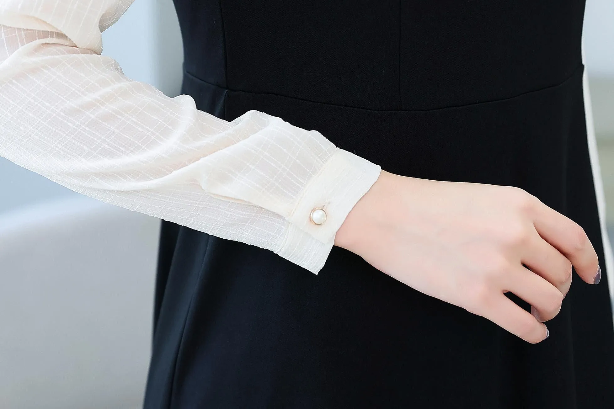 Elegantly Designed Women's Long Sleeve Tea Dress with Thigh-Length Cut