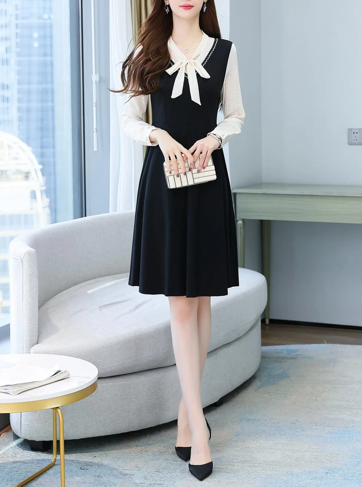 Elegantly Designed Women's Long Sleeve Tea Dress with Thigh-Length Cut
