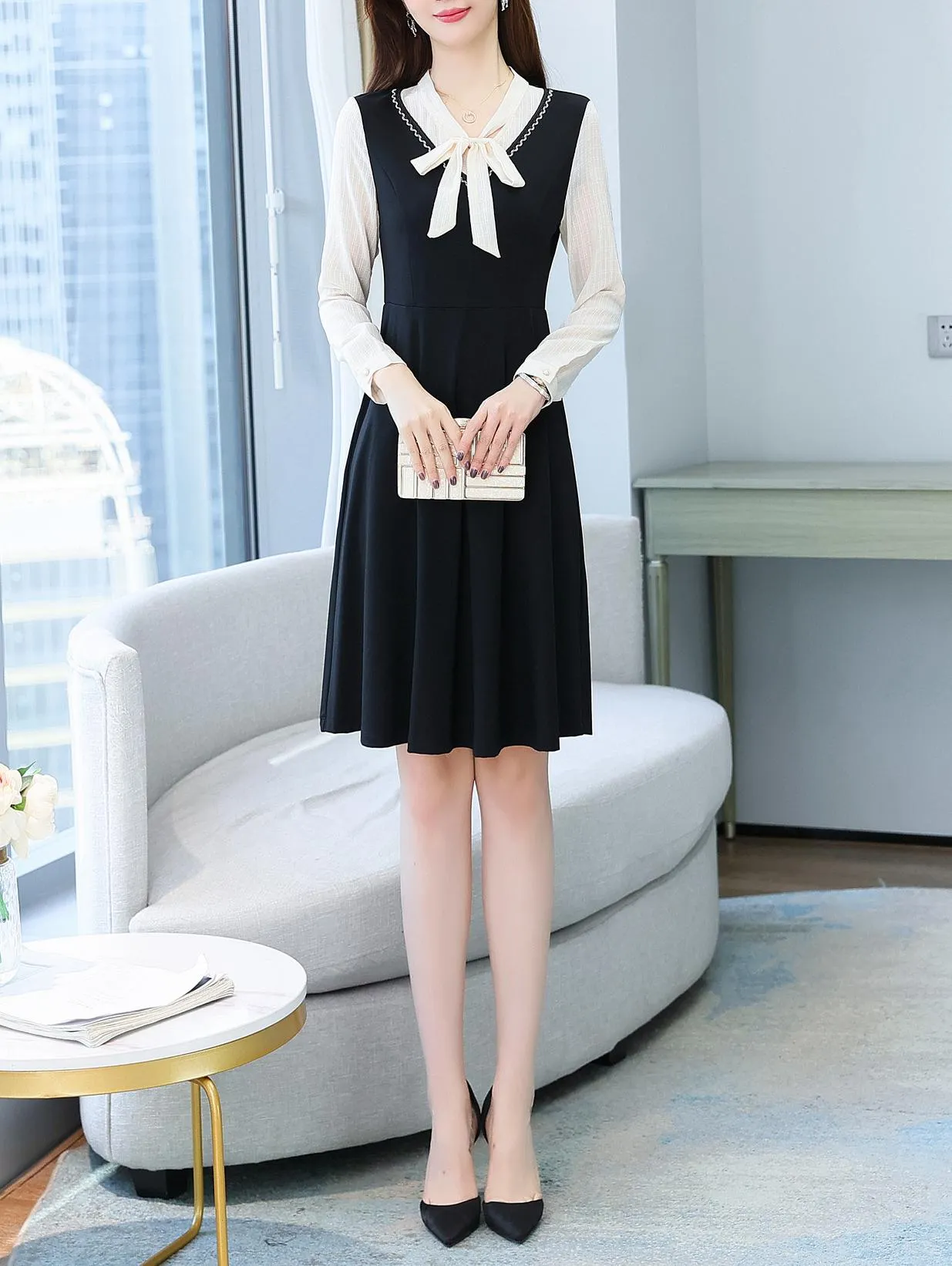 Elegantly Designed Women's Long Sleeve Tea Dress with Thigh-Length Cut