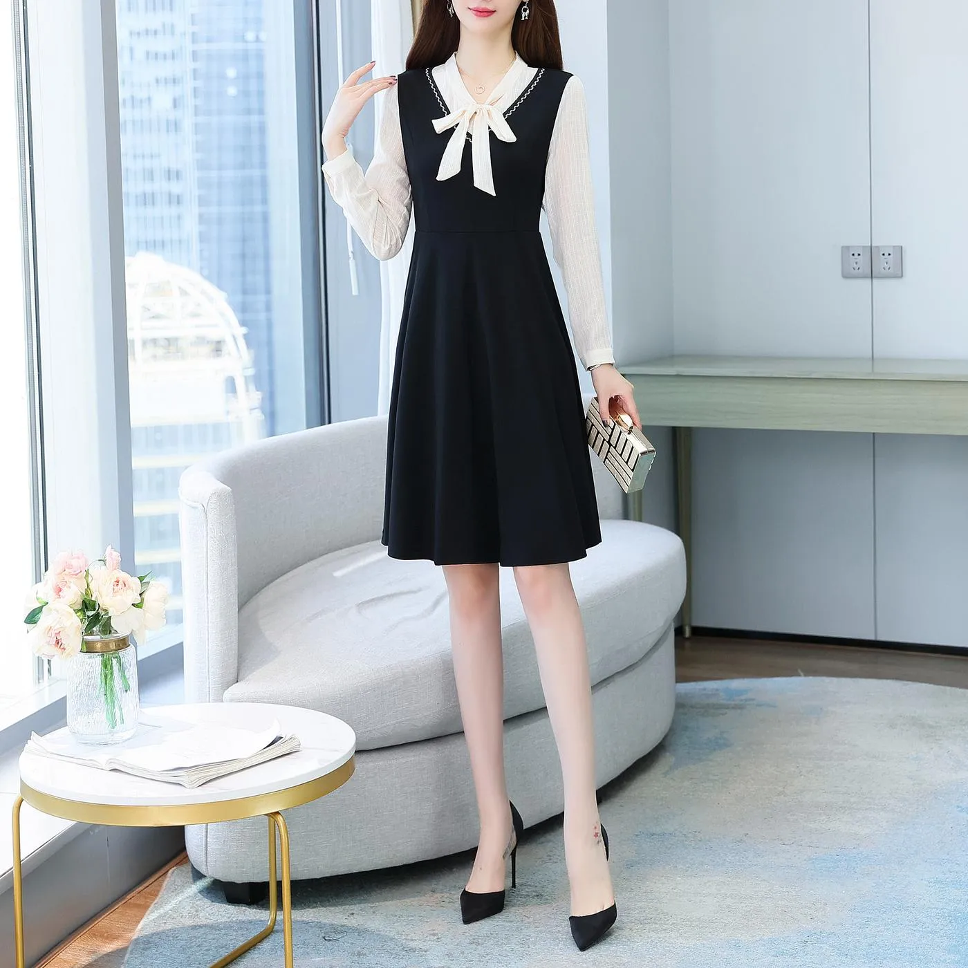 Elegantly Designed Women's Long Sleeve Tea Dress with Thigh-Length Cut