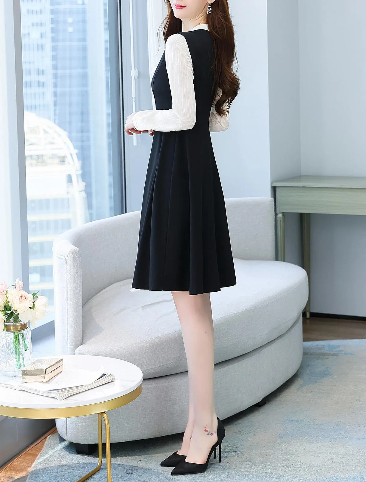 Elegantly Designed Women's Long Sleeve Tea Dress with Thigh-Length Cut