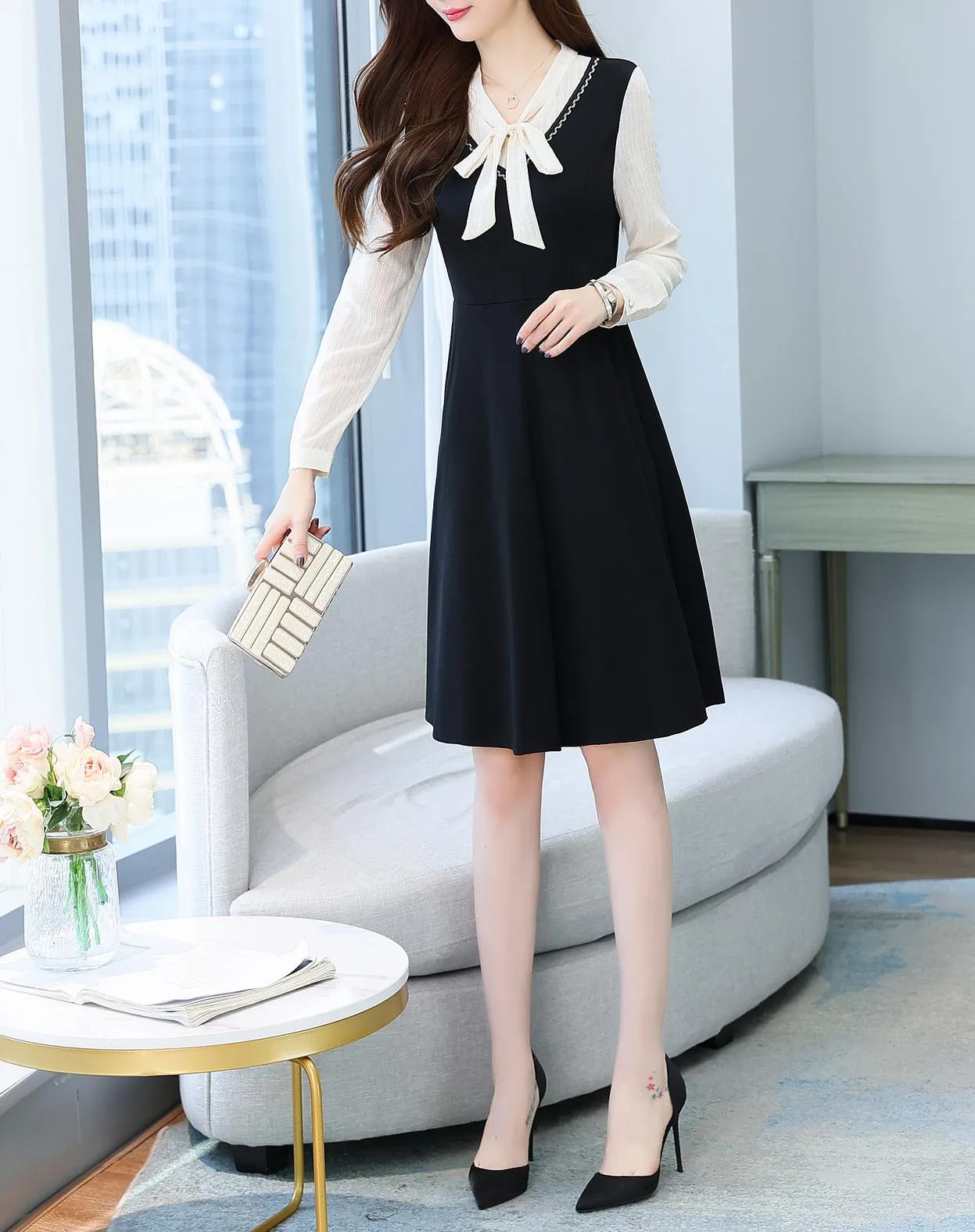 Elegantly Designed Women's Long Sleeve Tea Dress with Thigh-Length Cut