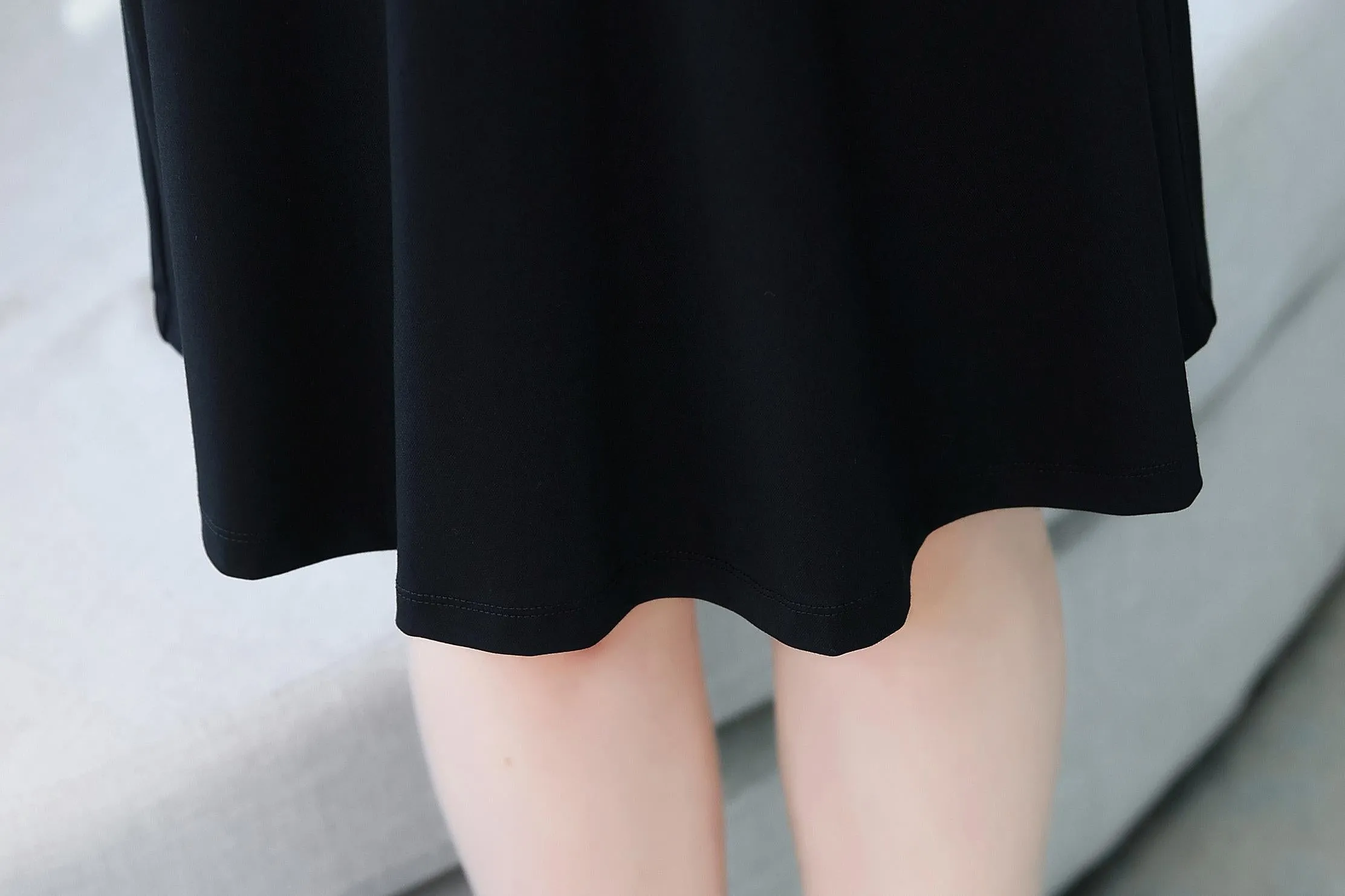 Elegantly Designed Women's Long Sleeve Tea Dress with Thigh-Length Cut