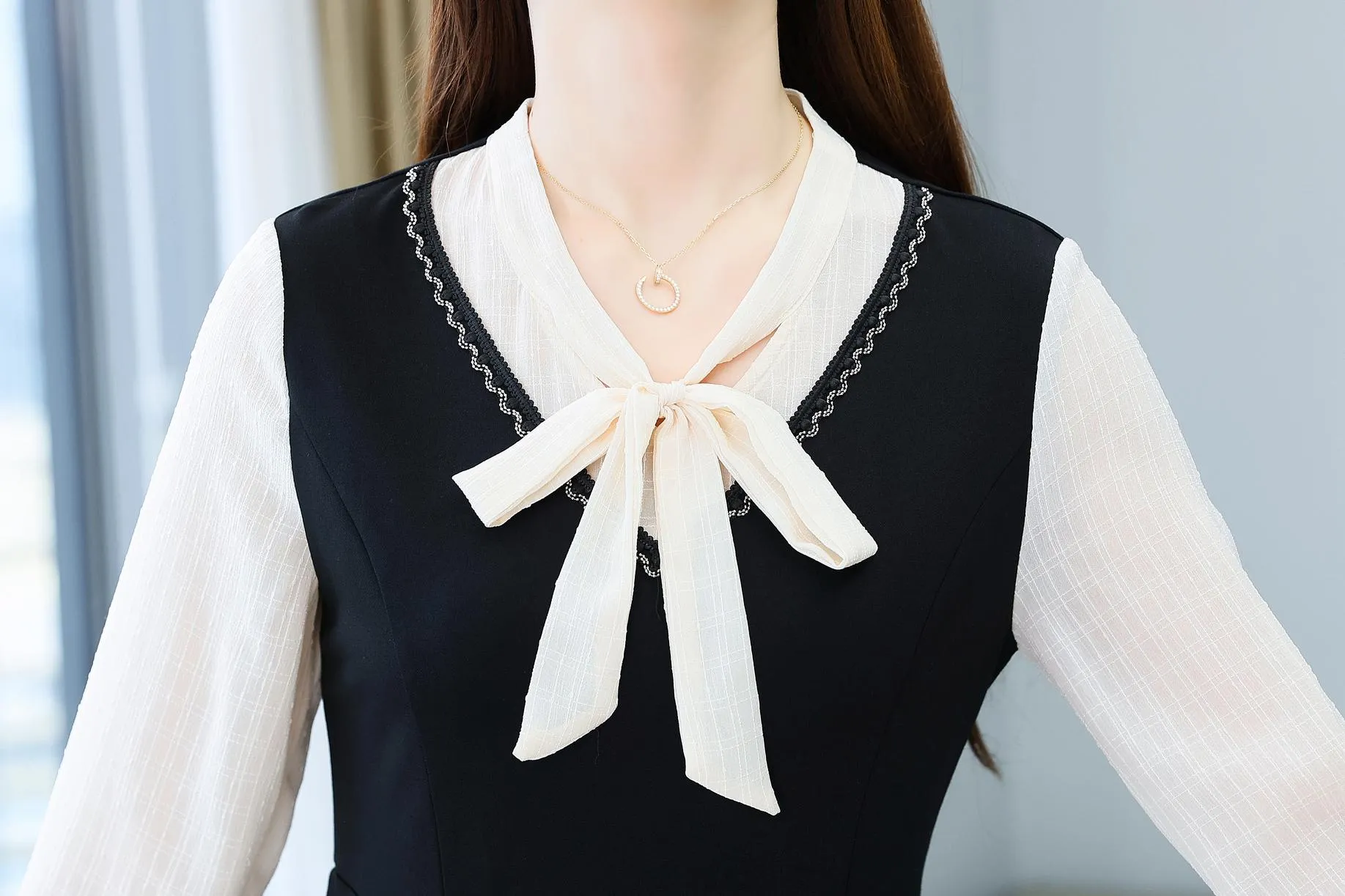 Elegantly Designed Women's Long Sleeve Tea Dress with Thigh-Length Cut