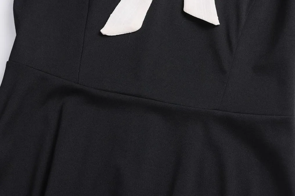 Elegantly Designed Women's Long Sleeve Tea Dress with Thigh-Length Cut