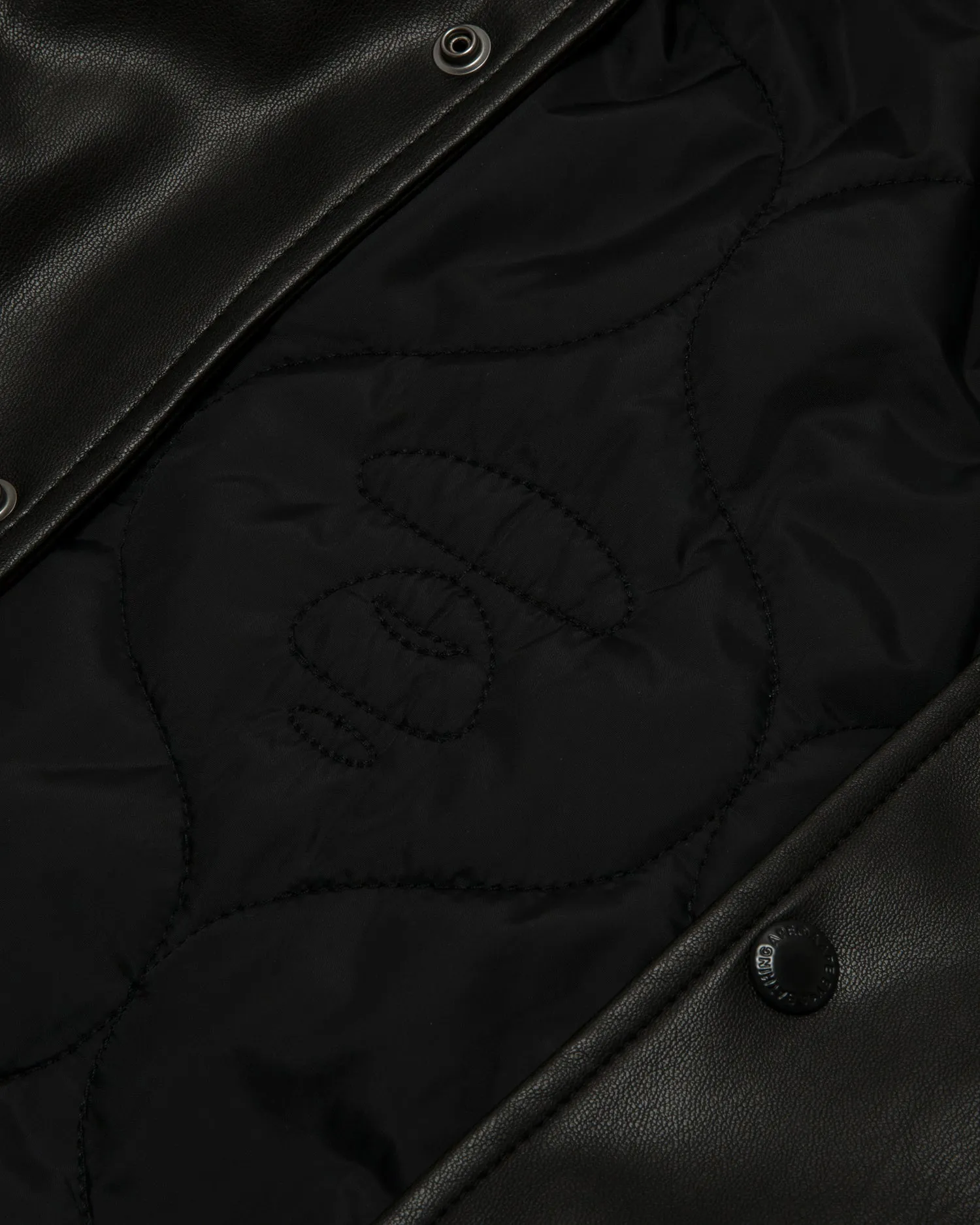 Moonface logo hooded faux leather jacket